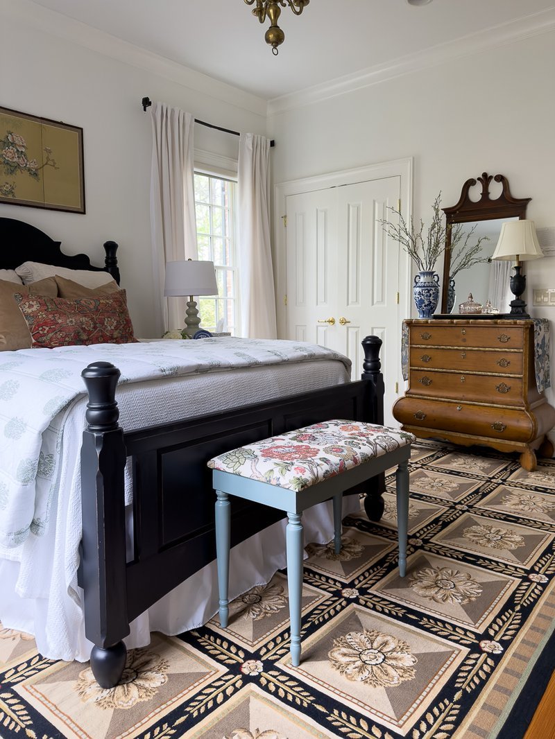 Floral fabric piano bench in vintage thrifted styling