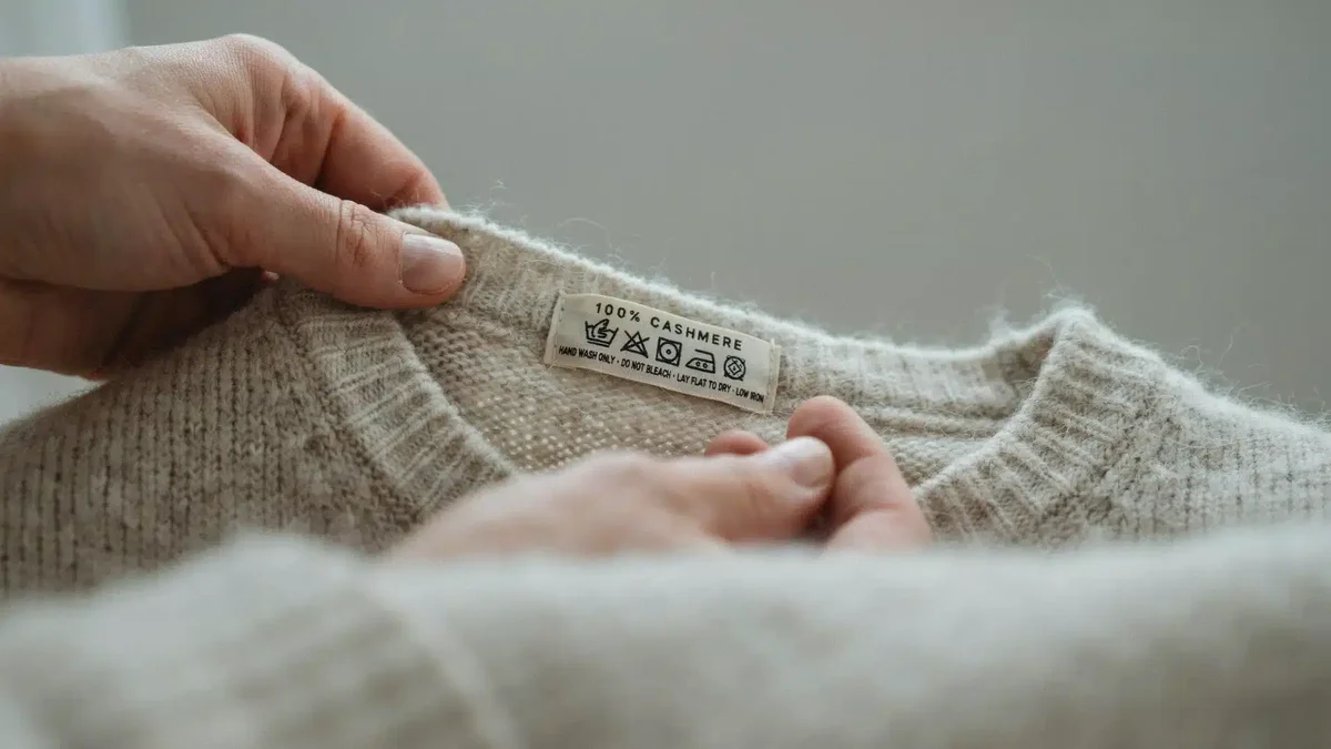 Closer look at a cashmere sweater care label